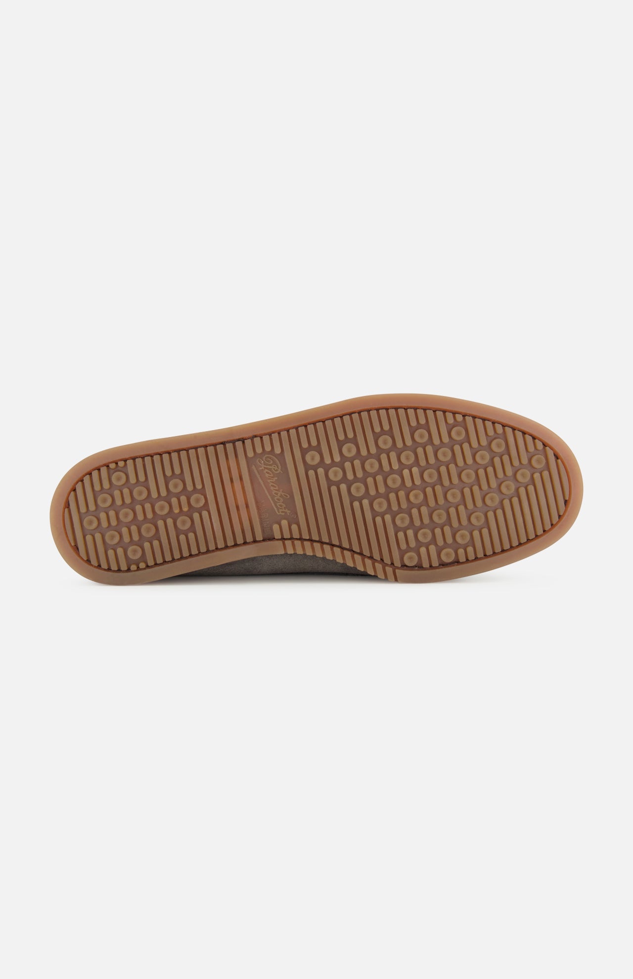The image shows the sole of Paraboot’s Barth Bateaux Boat Loafer, featuring a gum-colored rubber base with circles and lines for grip. The shoe size appears at the center, reflecting quality akin to hand-stitched craftsmanship.
