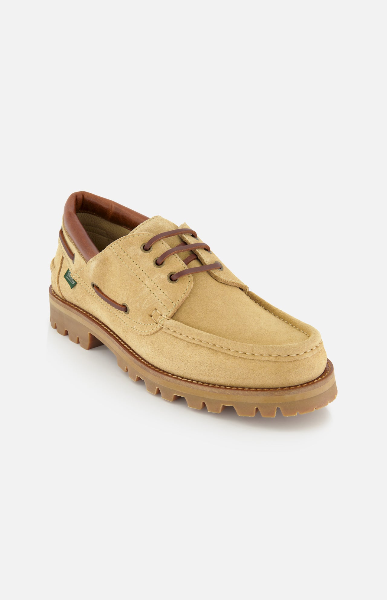 The Paraboot Briac Suede Lace Loafers feature tan suede, brown leather trim, dark brown laces, visible stitching, a rugged rubber sole, and a small green logo tag. Crafted with Norwegian welt construction and shown on a white background.