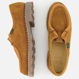 The Paraboot Michael Derby Lace Loafer features tan suede, chunky rubber soles, and Norwegian welt construction, displayed from the side and top views on a white background.