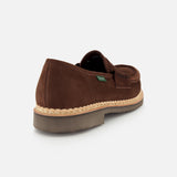The Paraboot Nantes Slip On Loafer features brown suede with a beige woven trim above a thick rubber sole, crafted using Norwegian welt construction, shown from the back against a plain white background.