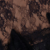 Bianca Lace Deep V-neck Gown featuring a black sheer floral lace overlay on a nude-colored background.