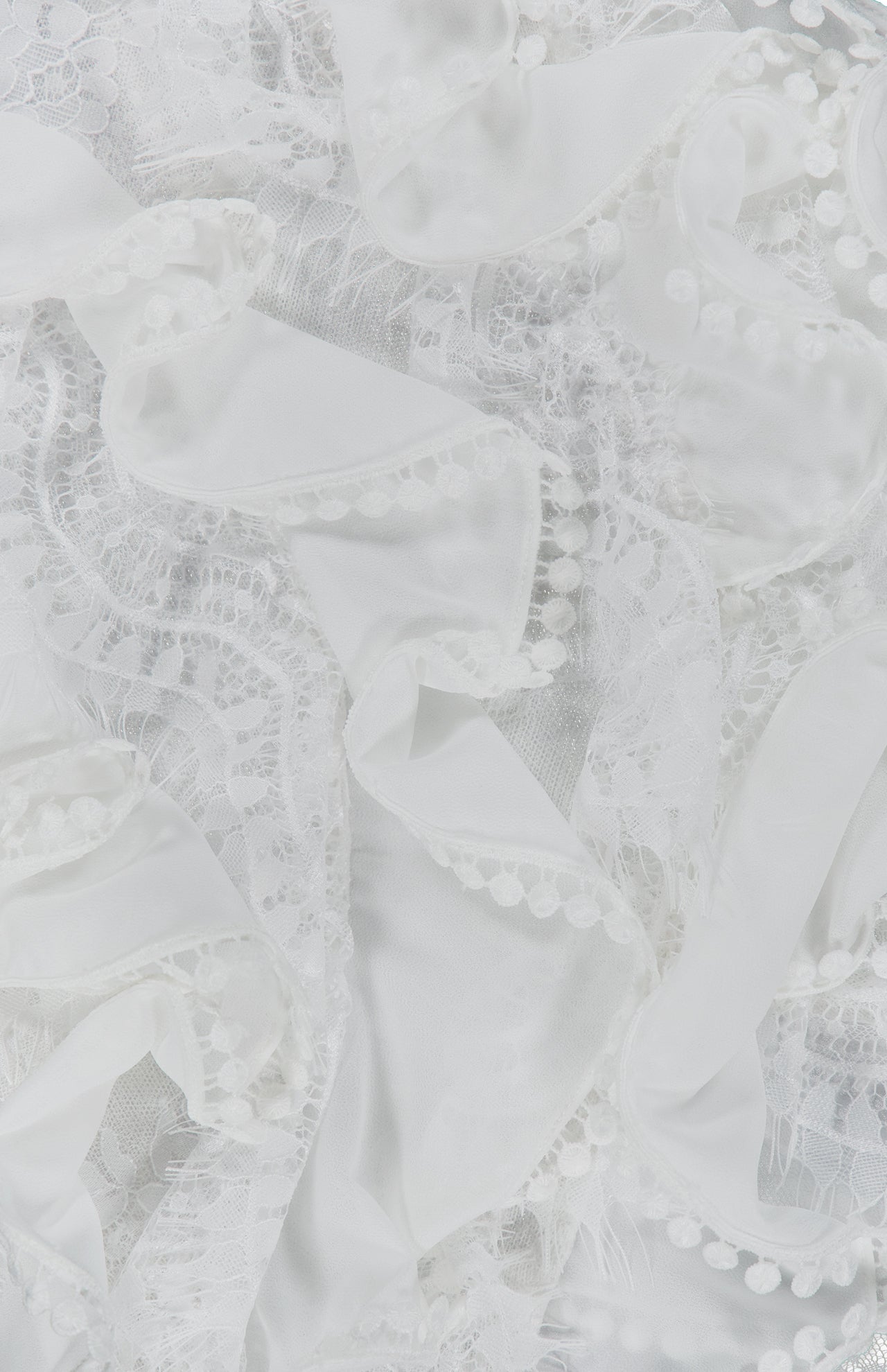 PATBO Bianca Lace Top in off-white featuring ruffled trim and pom-pom detailing.