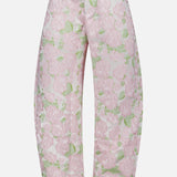 The Garden Jacquard Pants by PATBO are high-waisted, wide-leg cropped trousers adorned with a delicate pink and green floral jacquard on a white background, finished with a front button and zip closure—ideal for achieving an elegant garden party look.