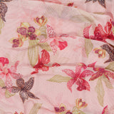 The PATBO Orchid Bloom One Shoulder Chiffon Mini Dress features sheer pink fabric with an orchid floral print in red, pink, purple, and green, softly gathered for a delicate, feminine look.