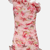 The PATBO Orchid Bloom One Shoulder Chiffon Mini Dress features a fitted, sleeveless design with sheer ruched fabric, orchid floral print in pink, green, and cream tones on light pink, plus ruffled neckline and hem details.