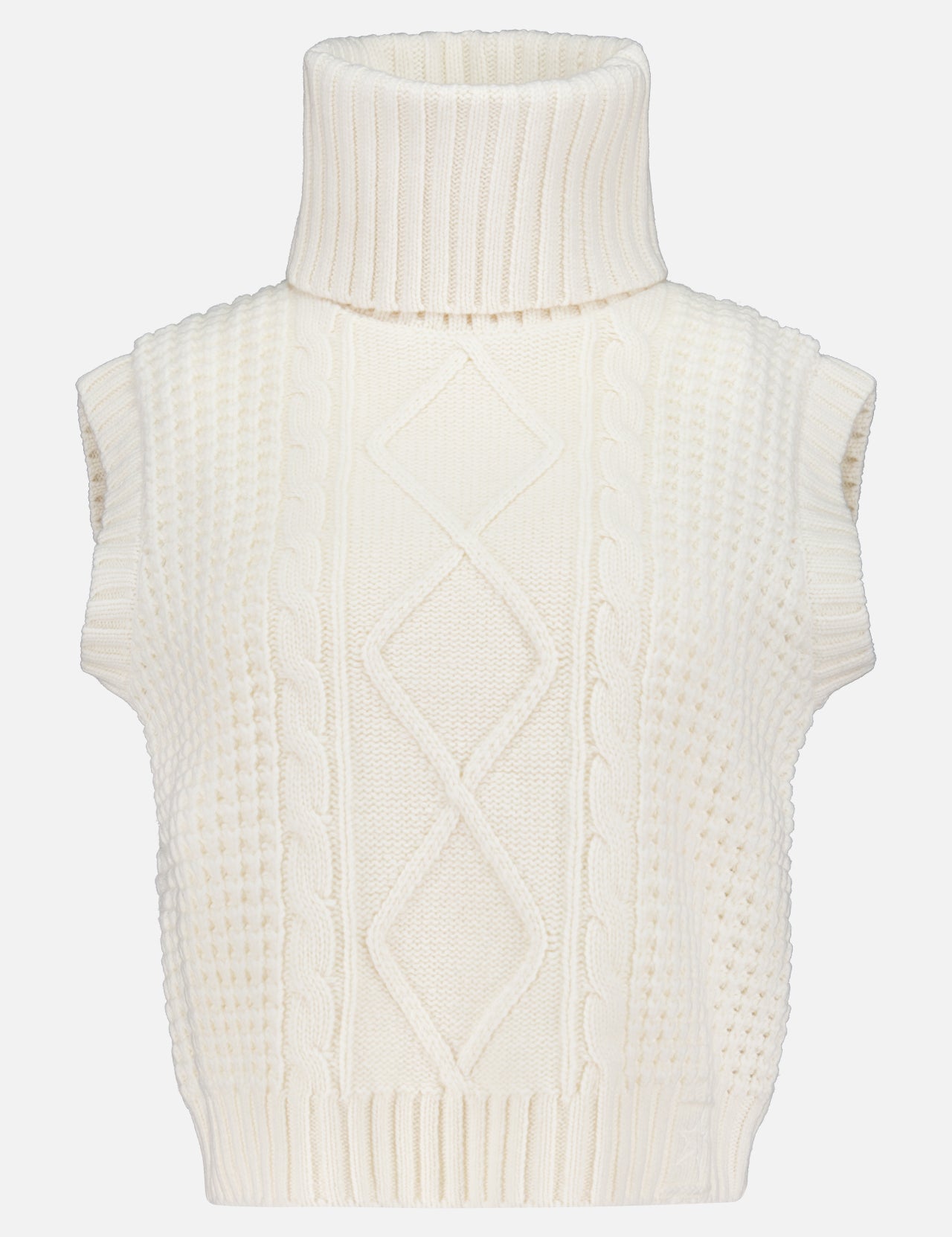 The Crystal Turtleneck Tank Top by PERFECT MOMENT is an ivory, sleeveless Merino wool knit with a chunky cable pattern and ribbed collar—a cozy, textured essential for winter sports layering.