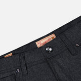 Close-up of the waist area of PESCAROLO Nerano M Cashmere Pants in dark gray, featuring a metallic button, belt loops, and a Supercord label. The soft, wool-like cashmere fabric is complemented by a classic 5-pocket design.