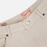 Close-up of the Nerano M Cotton Linen 5 Pockets Pant by PESCAROLO in beige, featuring a cotton linen-blend waistband, white button, belt loops, signature red brand label inside, and size 48 marking.