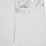 The PESCAROLO Nerano M Cotton Silk 5 Pockets Pant features light beige, smooth, lightweight fabric with a zipper and button fly, orange stitching, a visible brand label inside the waistband, and a classic 5-pocket design.