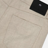 Close-up of the back pocket and waistband of PESCAROLO Nerano M Flannel Pants in beige, highlighting the classic 5-pocket design with a black patch subtly embossed with branding and a visible belt loop, set against a plain background.