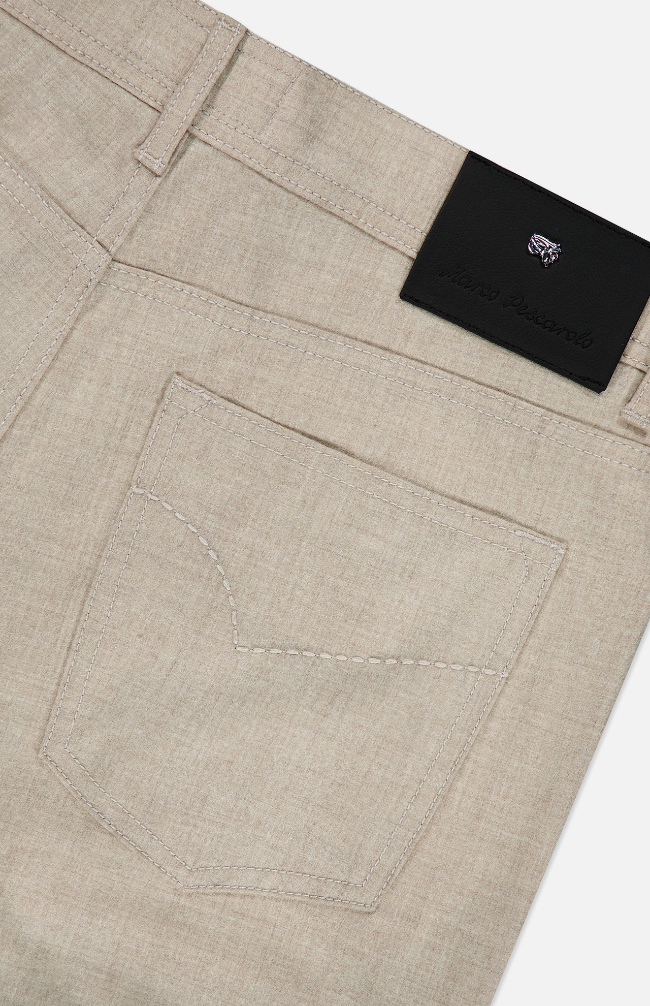 Close-up of the back pocket and waistband of PESCAROLO Nerano M Flannel Pants in beige, highlighting the classic 5-pocket design with a black patch subtly embossed with branding and a visible belt loop, set against a plain background.