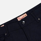 Close-up of the waistband and upper section of the Nerano M Plaid Pants by PESCAROLO, highlighting the classic 5-pocket design along with a button, belt loops, pockets, and a Pescarolo brand label sewn inside the waistband.
