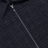 Close-up of a dark grey plaid wool-blend PESCAROLO Quarantuno Zipped Up Jacket with a collar.