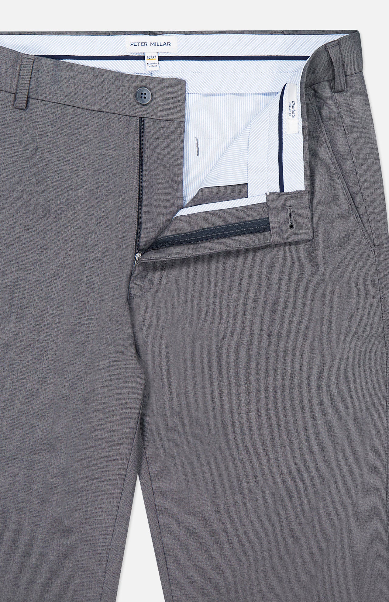 Close-up of the Charlotte Performance Trouser Pant in grey stretch mélange, with the waistband and zipper fly open to reveal a striped inner lining and a PETER MILLAR branded waistband label.