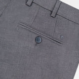 Close-up of the back pocket area of the PETER MILLAR Charlotte Performance Trouser Pant in gray stretch mélange, featuring a single buttoned welt pocket, belt loops, and subtly textured fabric.