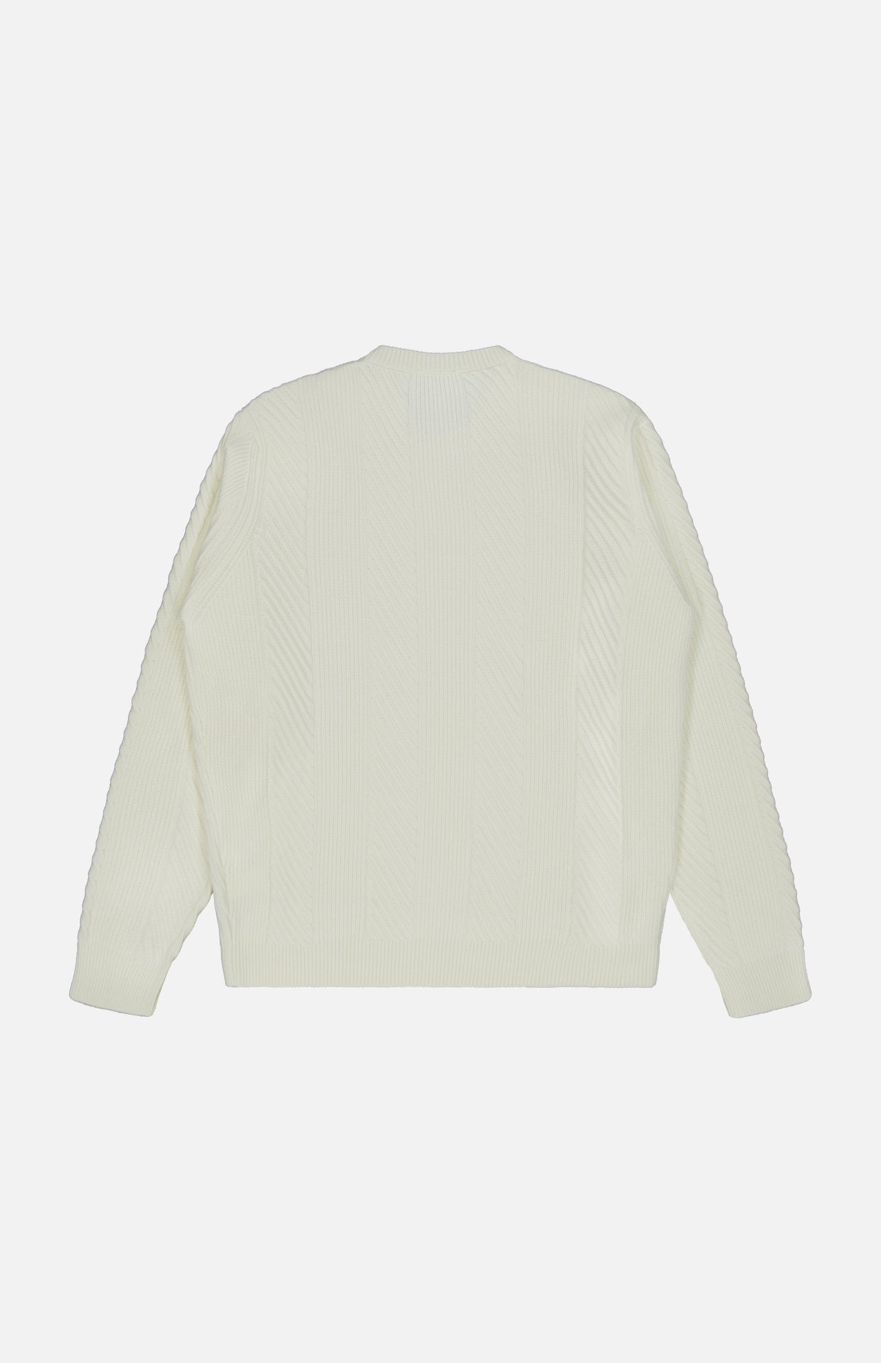 The Dolomite Crewneck Sweater by PETER MILLAR is displayed laid flat with the back side facing up against a white background. This off-white, long-sleeve knit features a subtle vertical ribbed pattern, crafted from a luxurious wool-cashmere blend for understated texture and elegance.