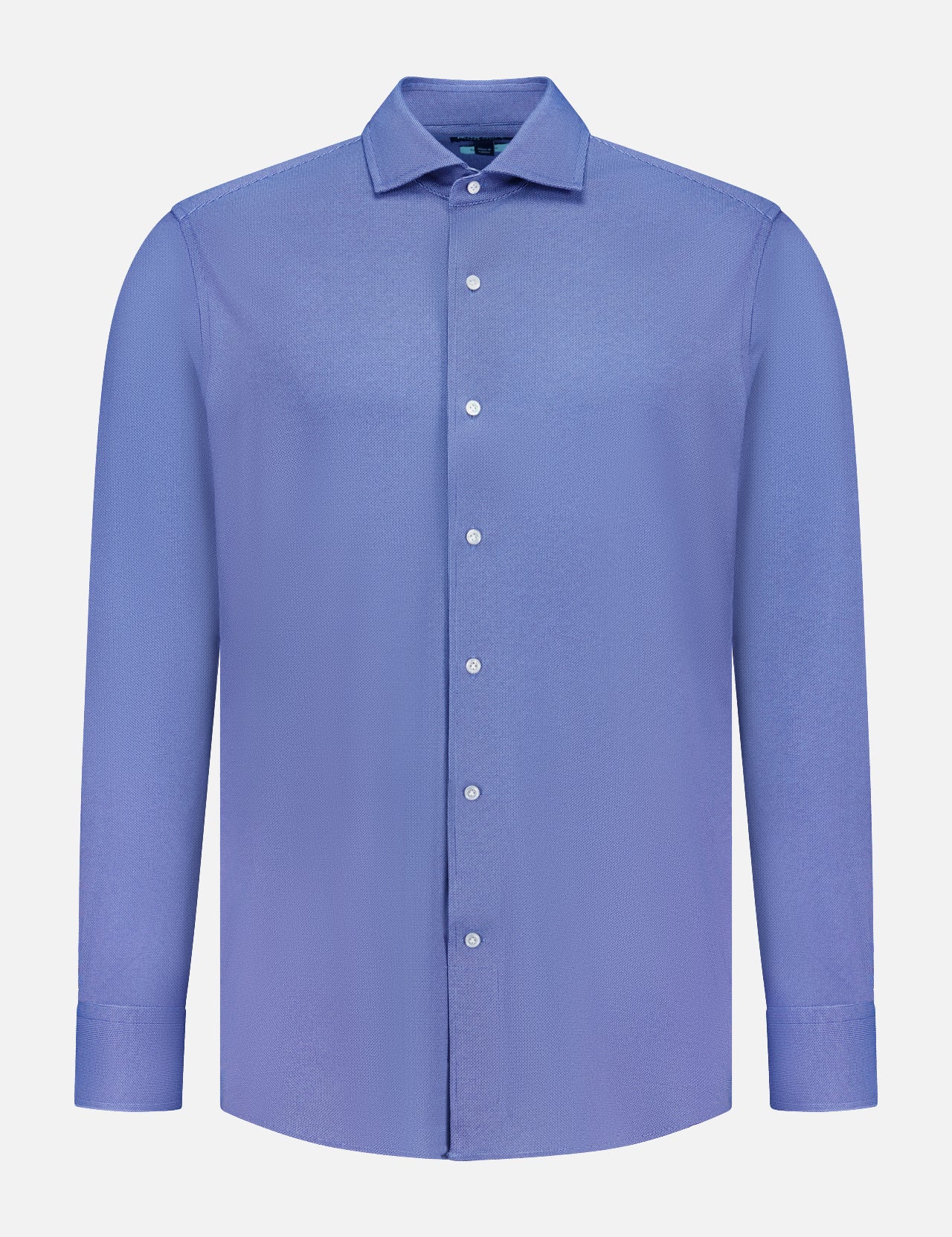 The PETER MILLAR Excursionist Flex Print Sport Shirt is a long-sleeved, button-up shirt in light blue, displayed on a plain white background. Crafted from wrinkle-resistant cotton-stretch fabric, this shirt features a classic collar and white buttons.