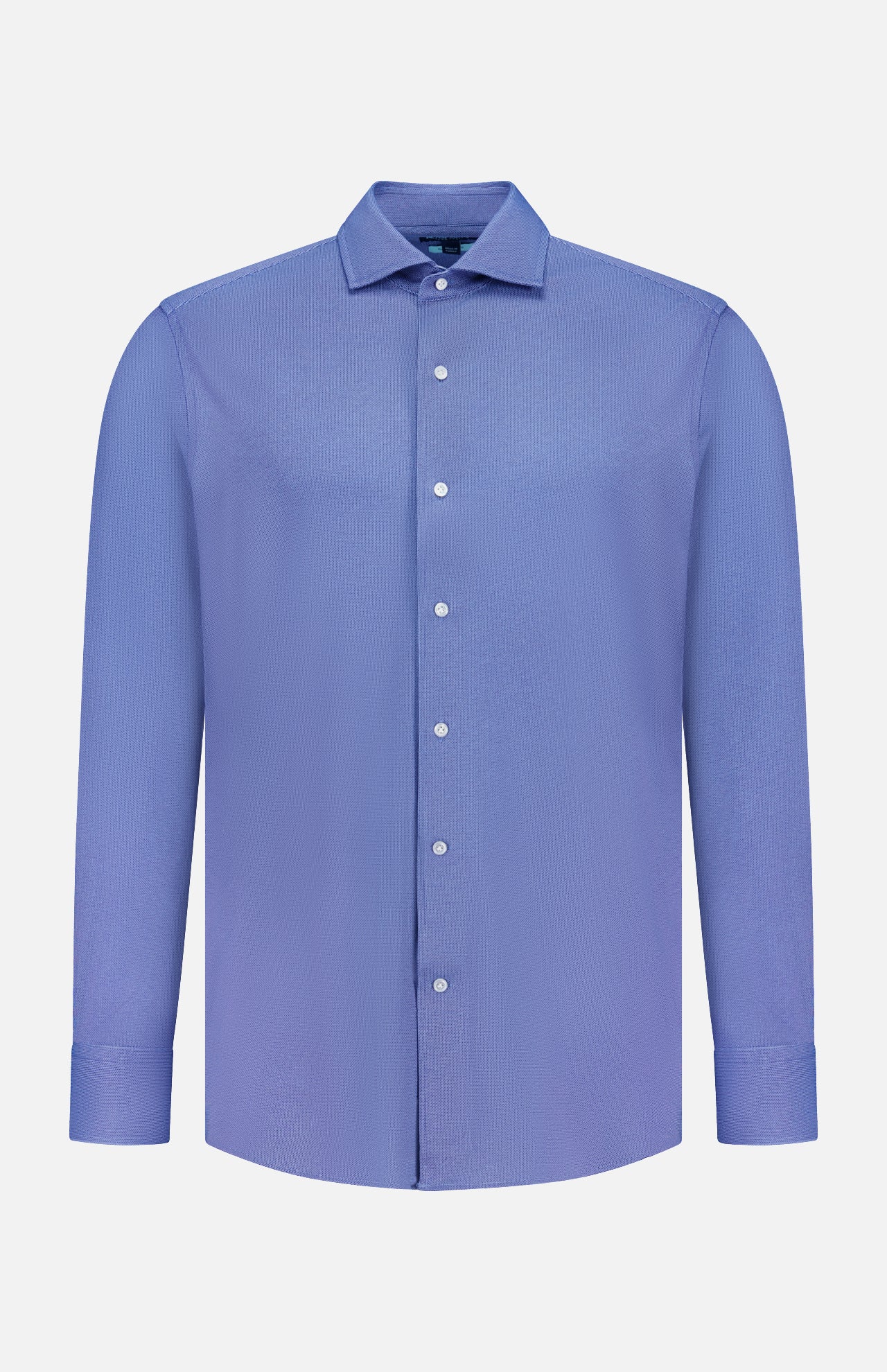 The PETER MILLAR Excursionist Flex Print Sport Shirt is a long-sleeved, button-up shirt in light blue, displayed on a plain white background. Crafted from wrinkle-resistant cotton-stretch fabric, this shirt features a classic collar and white buttons.