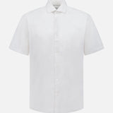 The Seaward Cotton Lyocell Sport Shirt by PETER MILLAR is a lightweight white, plain short-sleeve button-up with a classic collar, shown against a white background.