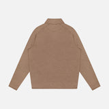 The PETER MILLAR Stealth Performance Quarter-Zip Sweater is displayed from the back on a plain white background. Featuring a brown color, this lightweight pullover has a simple collar and straight hem, with no visible logos, patterns, or fastenings.