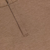Close-up of the PETER MILLAR Stealth Performance Quarter-Zip Sweater in brown, featuring a hidden placket and collar, laid flat on a white surface. The subtly textured fabric and precise stitching along the seams and placket are visible. This lightweight pullover combines everyday style with exceptional comfort.
