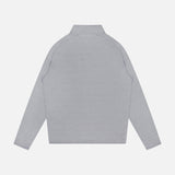 A PETER MILLAR Stealth Stripe Performance Quarter-Zip Sweater is shown laid flat and viewed from the back. This lightweight pullover features a simple collar, no visible patterns or logos, and is designed with four-way stretch to provide a comfortable fit for everyday wear.