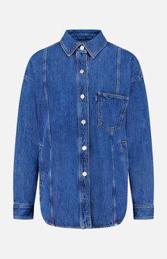 The 3.1 PHILLIP LIM Oversized Denim Shirt Jacket features long sleeves, white buttons, a left chest pocket, and seam detailing, shown against a plain light background.