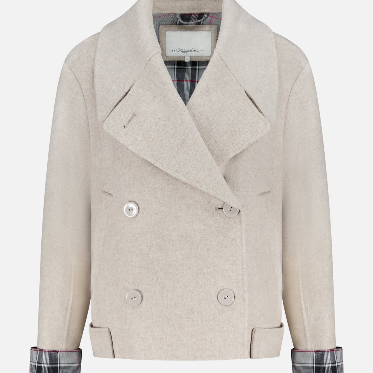 The 3.1 PHILLIP LIM Recycled Wool Peacoat with Plaid Combo is a beige, double-breasted cropped coat with wide lapels, cuffed plaid sleeves, and two front pockets, made from Italian recycled wool and shown against a white background.