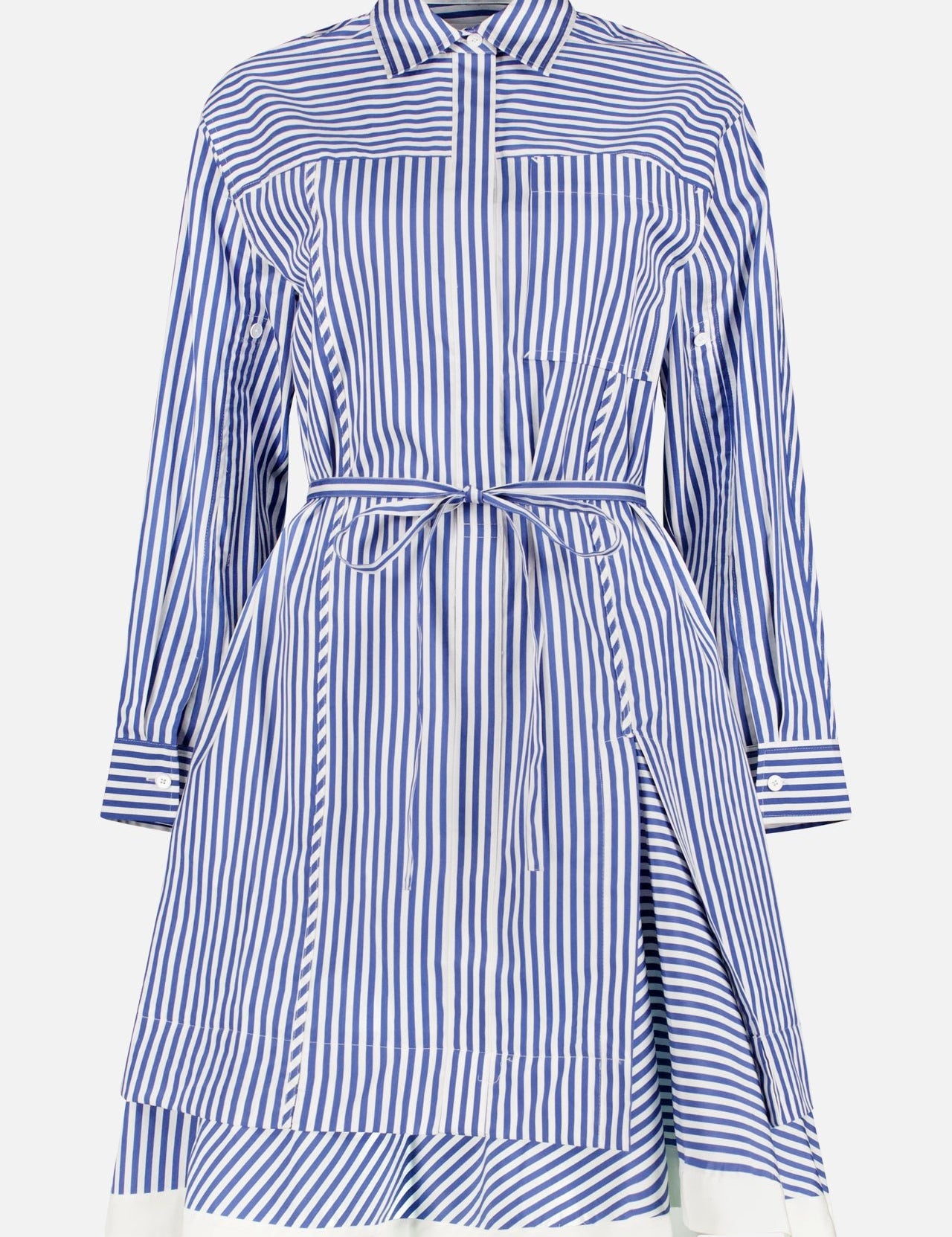 The Striped Peplum-hem Shirt Dress by 3.1 PHILLIP LIM features long sleeves, blue and white stripes, a collared neckline, buttoned cuffs, concealed placket, waist tie belt, and an asymmetric flared peplum hem.