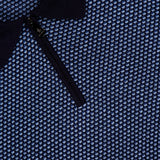 Close-up of a textured blue and navy PIACENZA 1/4 Zip Knit Polo Shirt featuring a black zipper and collar, with the PIACENZA label visible near the collar.