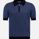 The PIACENZA 1/4 Zip Knit Polo Shirt is a men's designer short-sleeve navy polo with a textured pattern, black collar, cuffs, and waistband, finished with a stylish short zipper at the center of the collar.