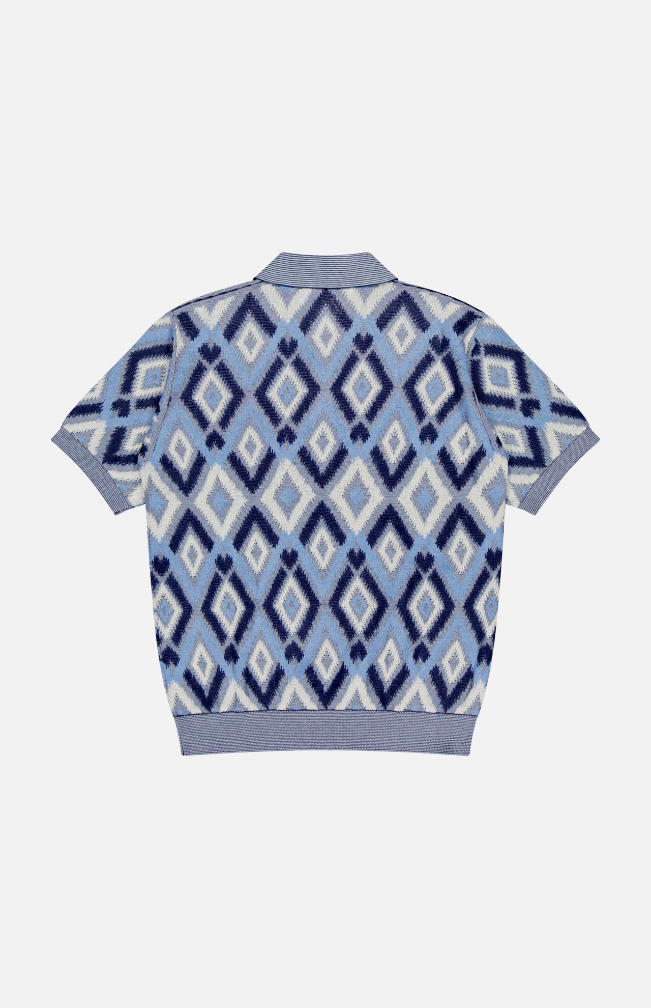 The PIACENZA Diamond Shaped Print Knit Polo Shirt features a blue, white, and light purple argyle pattern with ribbed collar, cuffs, and hem. Short sleeves; shown flat on a white background.