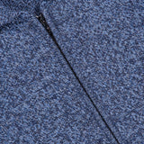 Close-up of the PIACENZA Plain Stitch Knit Full Zip Jacket in blue and gray heather, highlighting the zipper, texture, and stitching—crafted with quality akin to premium Italian knitwear.