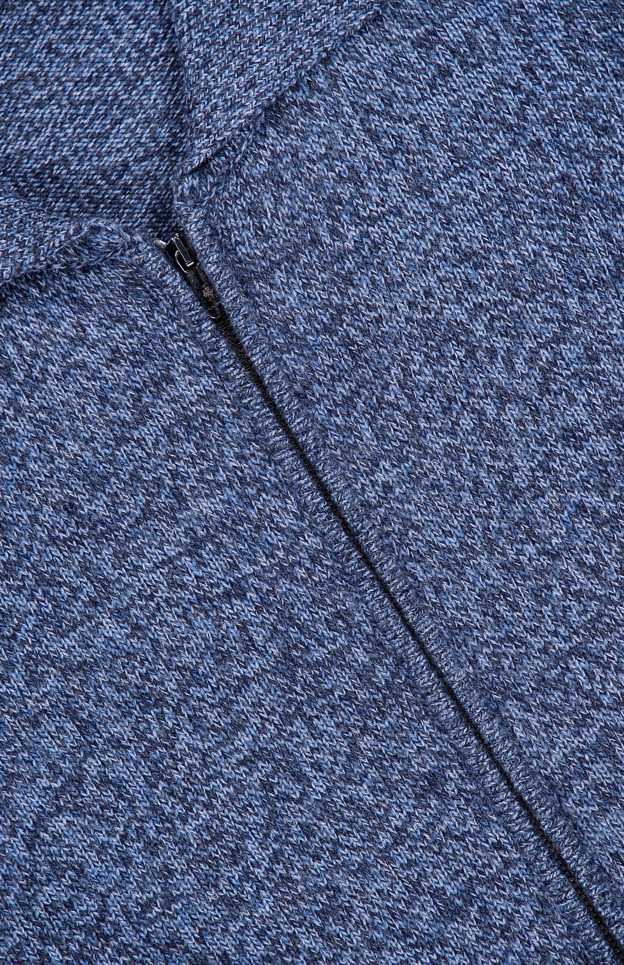 Close-up of the PIACENZA Plain Stitch Knit Full Zip Jacket in blue and gray heather, highlighting the zipper, texture, and stitching—crafted with quality akin to premium Italian knitwear.