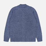 A blue PIACENZA Plain Stitch Knit Full Zip Jacket is laid flat, back side up. It features long sleeves, a ribbed collar, hem, and cuffs, textured wool fabric, and is made in Italy.