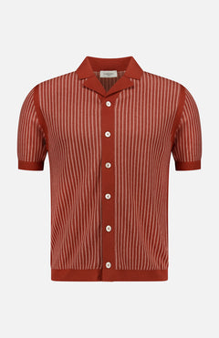 The PIACENZA Striped Knit Short Sleeve Button Up Polo Shirt in rust red features thin vertical white stripes, a collar, and white buttons, shown against a plain white background.
