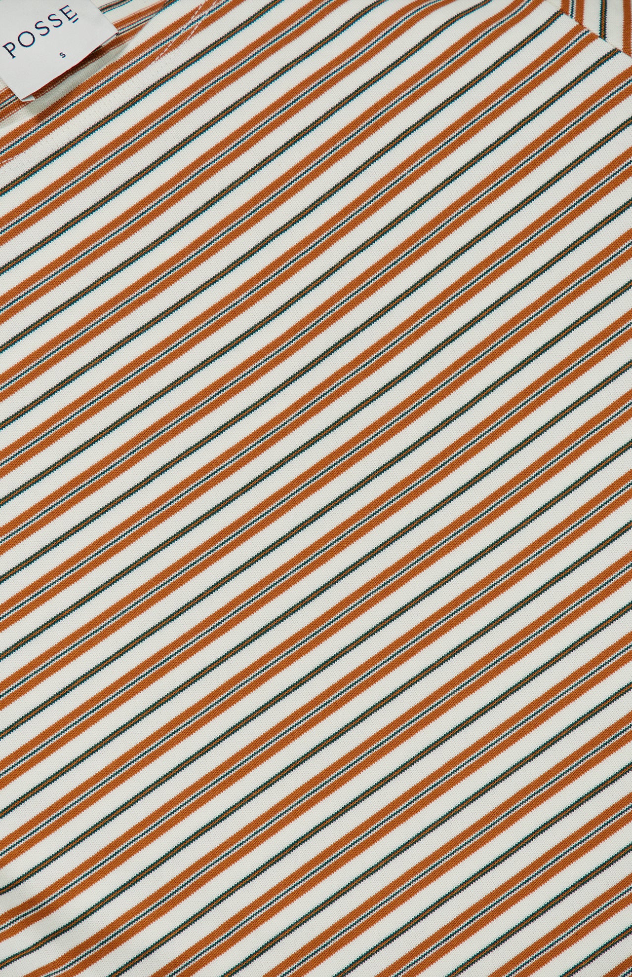 Close-up of a vintage-inspired Maeve Baby T-shirt with a ribbed texture and thin, diagonal brown and dark green stripes on a cream background.