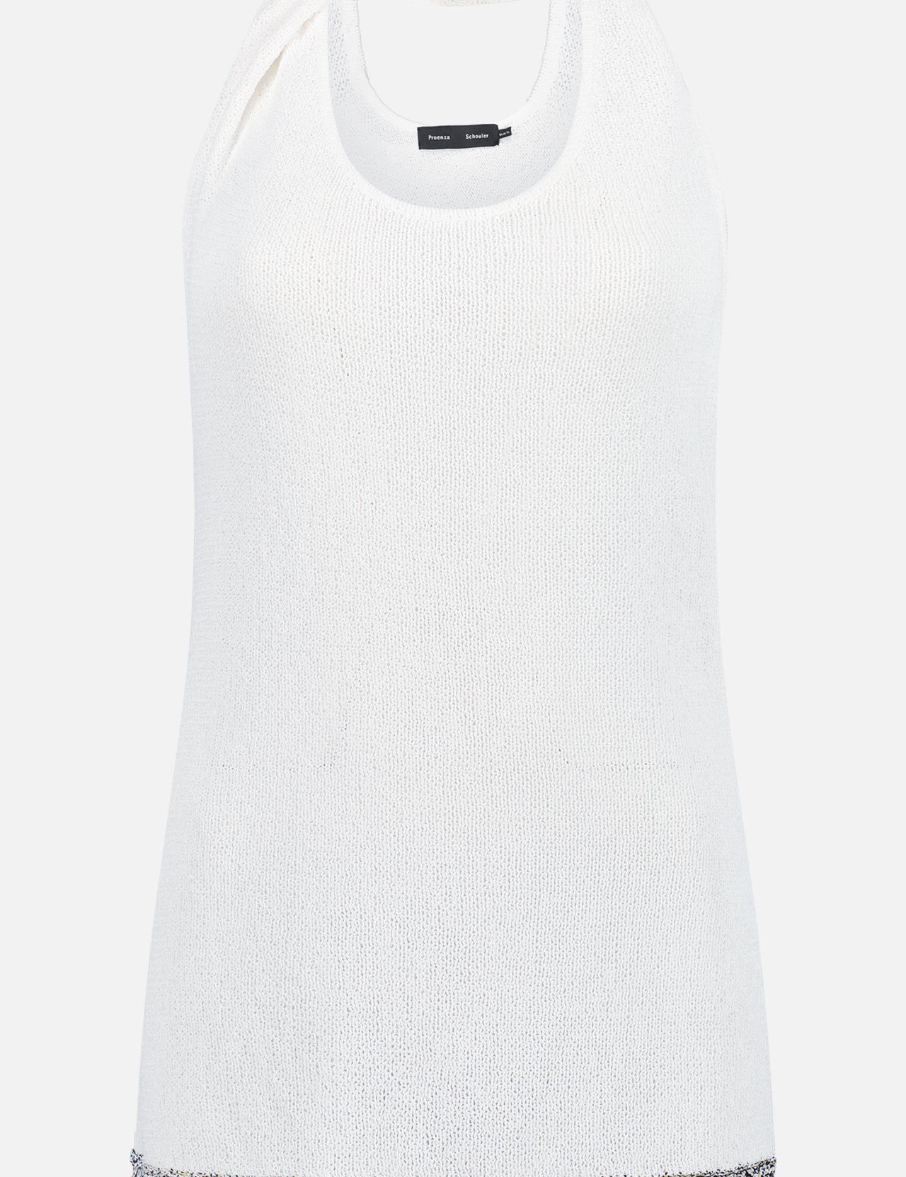 The Stevie Top by PROENZA SCHOULER is a sleeveless white top with a rounded neckline, textured hem in white, black, and gold thread, and an asymmetrical open back for a modern touch.