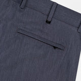 Close-up of the PT TORINO Active Superlight Wool Twill Trousers in dark grey, highlighting a single back pocket with button closure and belt loops against a light background.