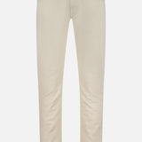 A pair of PT TORINO Cotton & Cashmere Stretch Tricotine Jeans in Stone displayed against a plain white background. Made in Italy, these slim-fit jeans feature a classic 5-pocket design with belt loops and a button closure at the waist.