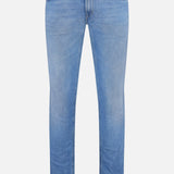 PT TORINO Denim Stretch Jeans feature a classic five-pocket design, belt loops, and button closure for a vintage look. Made in Italy, these light blue jeans are displayed on a white background.