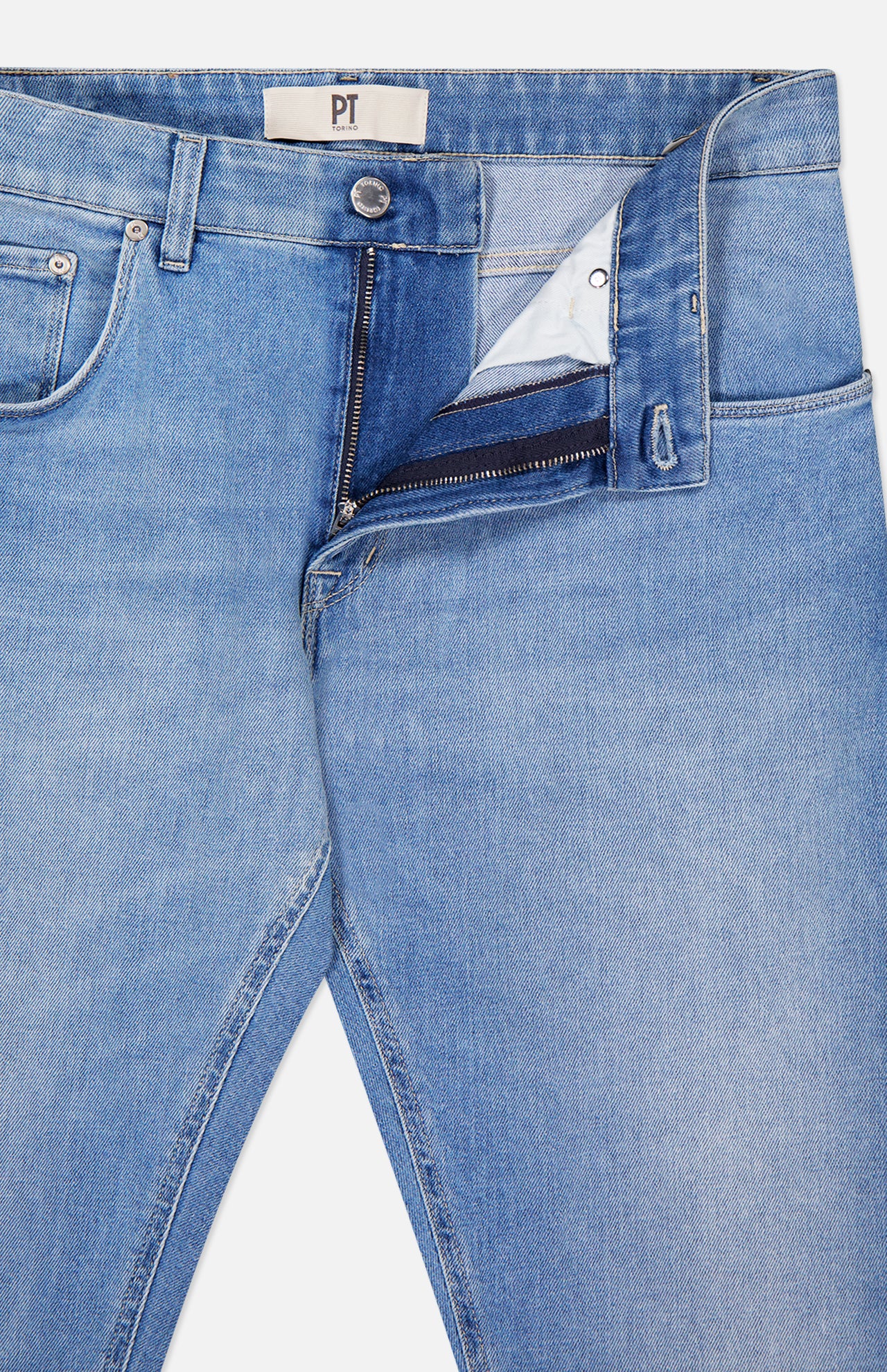 Close-up of PT TORINO Denim Stretch Jeans in light blue with open zipper and button fly, revealing the inside waistband and pockets against a white background.