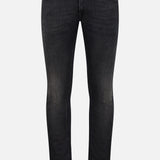 Introducing the PT TORINO Jazz Denim Stretch Jeans: a pair of premium black slim-fit jeans crafted from stretch denim, featuring front and back pockets, a button and zip fly closure, and subtle fading on the thighs.