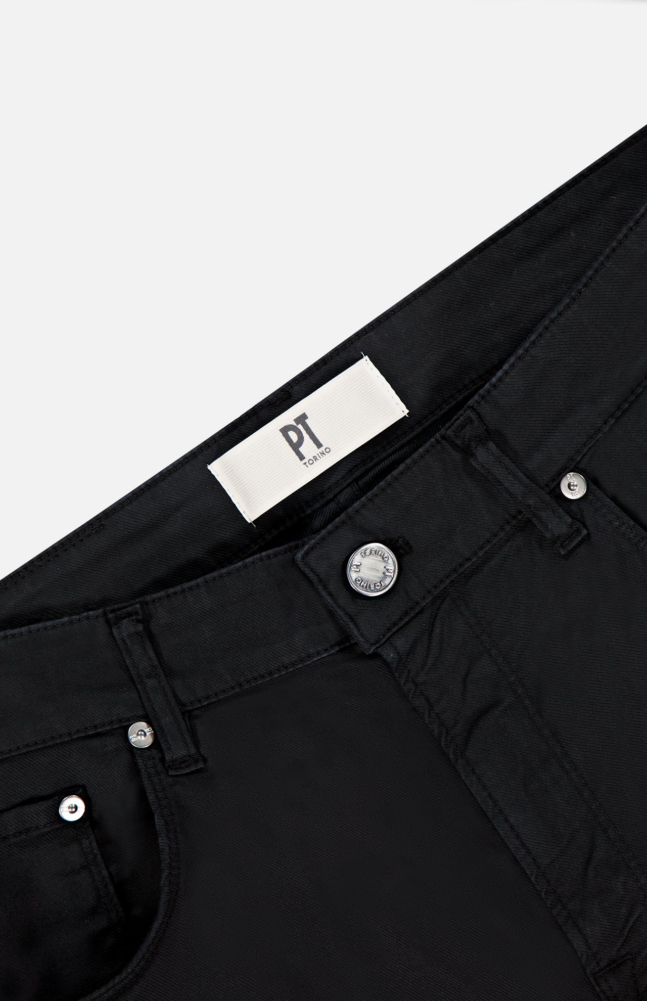 Close-up of the waistband and front pockets of Jazz Soft Stretch Gabardine Jeans by PT TORINO, showing classic 5-pocket design, silver rivets, a branded button, and an inner white PT TORINO Made in Italy label.