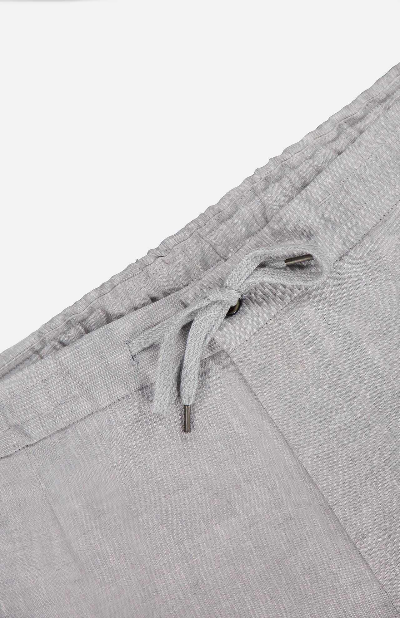Close-up of PT TORINO Linen Comfort Jogger in light grey, featuring an elastic waistband and fabric drawstring with metal tips. These men's pants offer breathable linen comfort against a plain background.