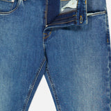 A pair of PT TORINO New Denim 5-Pocket Jeans with the zipper and top button undone, revealing the inside of the waistband and fly. The jeans are laid flat on a white background.