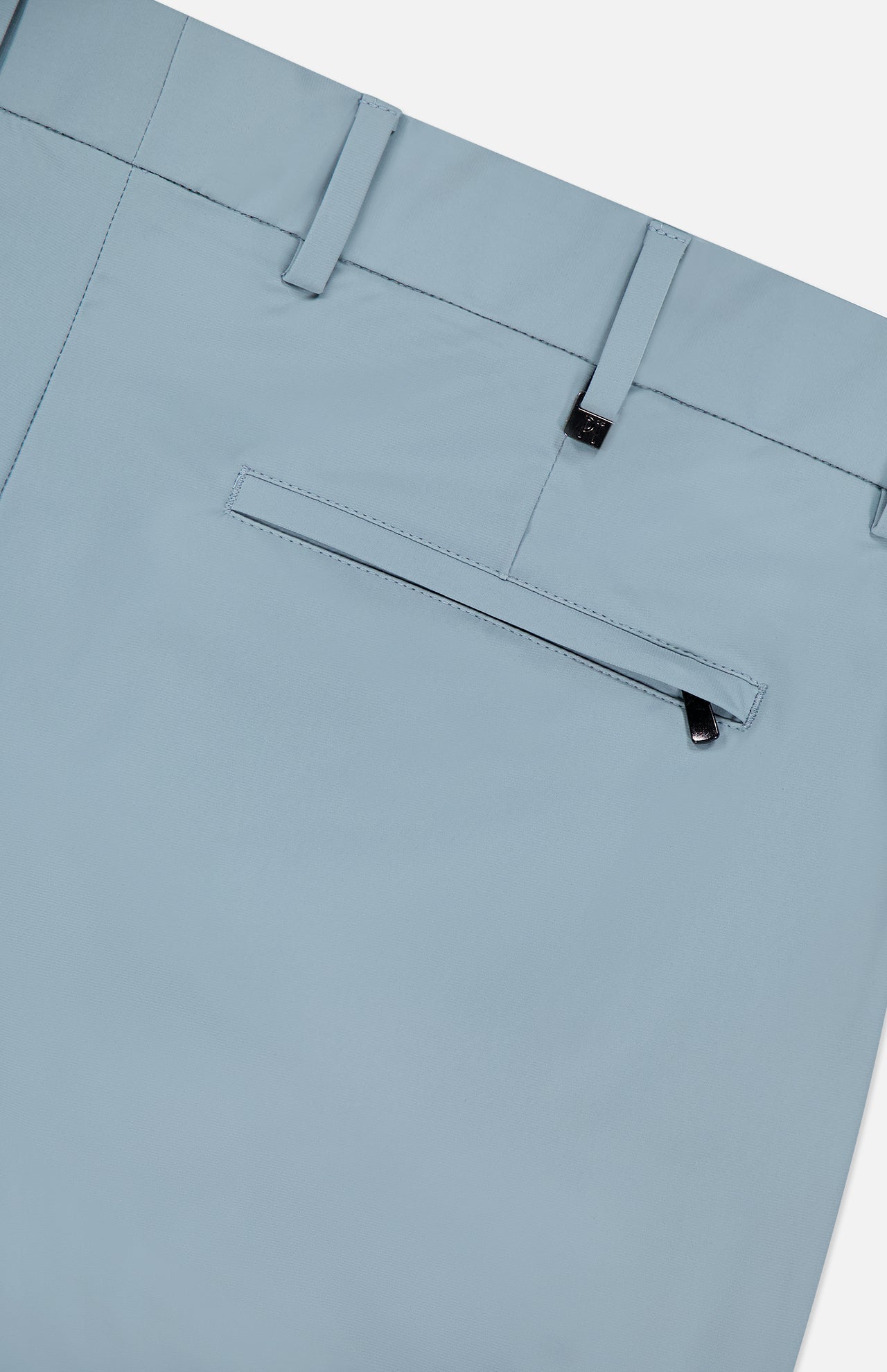 The PT TORINO Organic Kinetic Summer Trouser Pant is shown close-up, highlighting the back pocket with zipper, belt loops, and stretch kinetic fabric for comfort. These tailored dress pants offer a polished look.