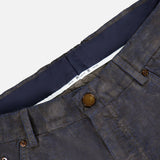 Close-up of the waistband and fly of navy Slim Stretch Cotton Corduroy Trouser Pants by PT Torino, showing the blue inner lining.