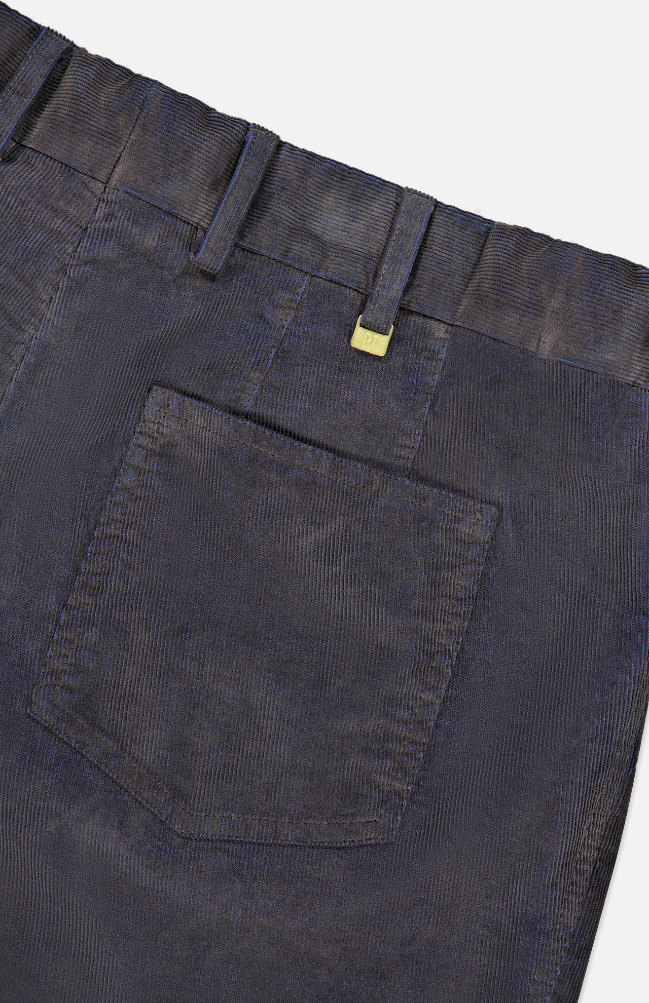 Close-up of the back pocket and waistband of navy Slim Stretch Cotton Corduroy Trouser Pants by PT Torino, featuring a small metallic PT label attached to a belt loop.