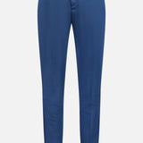 The PT TORINO Slim Flat Front Garment Dyed Trouser Pant in blue features a cotton silk blend, front button and zip closure, belt loops, and side pockets. Displayed on a plain white background.